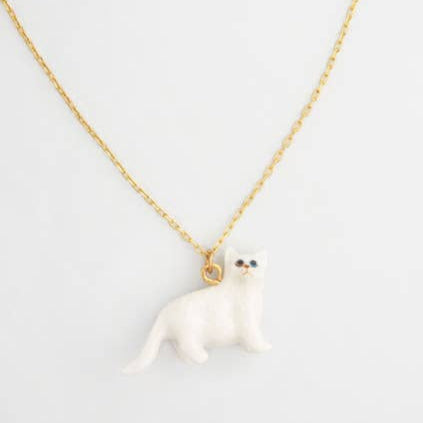 Necklace with a white cat-shaped pendant on a light gray background