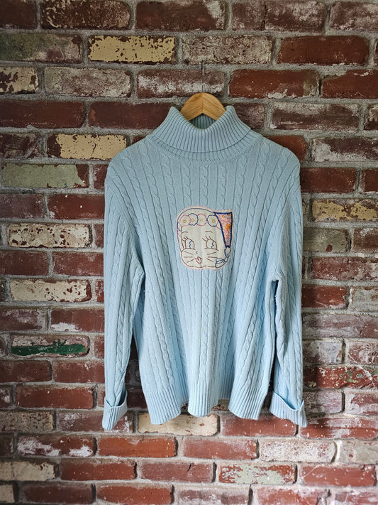 The "Fern" Upcycled Vintage Sweater - Upcycled Baby Blue Cableknit Turtleneck with Hand Embroidered Cat Patch