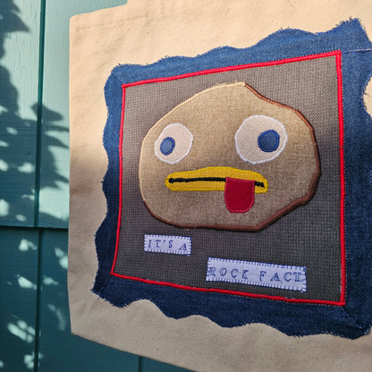 The It's a Rock Fact Tote - Canvas tote upcycled using upholstery fabric and deadstock denim
