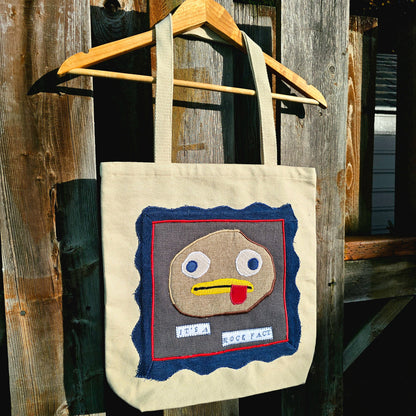The It's a Rock Fact Tote - Canvas tote upcycled using upholstery fabric and deadstock denim
