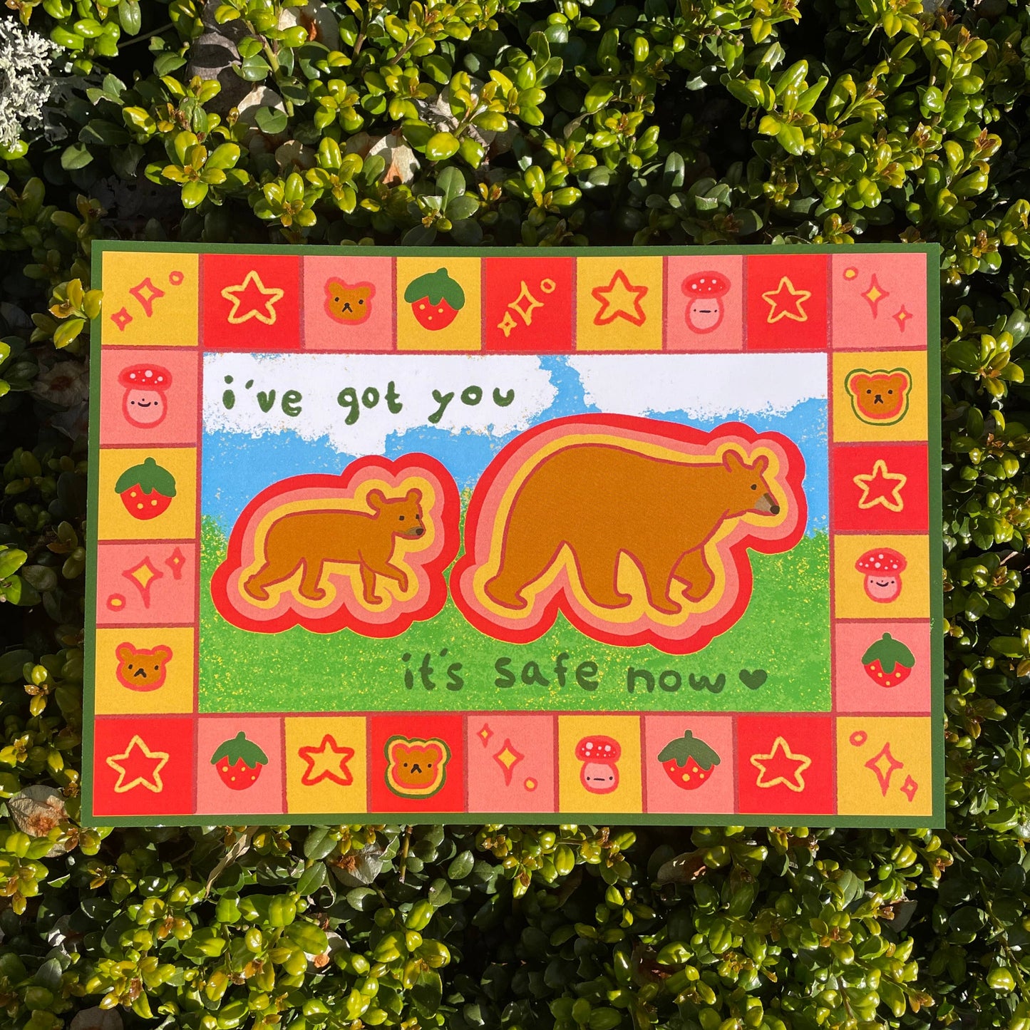 Print of two bears with text that reads "I've got you, it's safe now" on a green leaf background