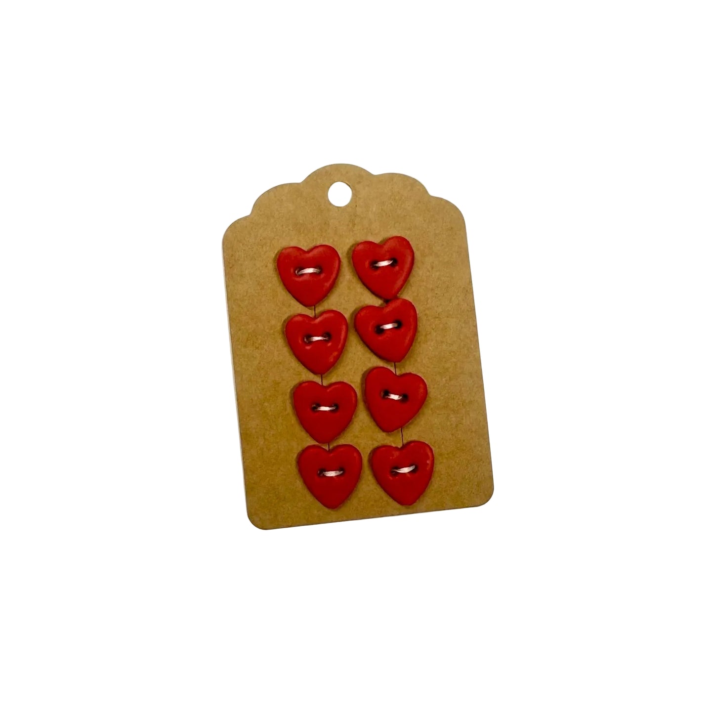 Red heart-shaped buttons on a brown cardboard backing with a hole for hanging, on a light gray background.