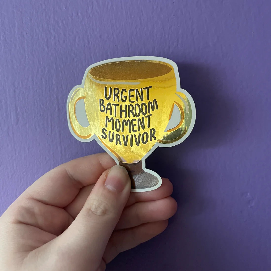 Urgent Bathroom Moment Survivor Metallic Gold Trophy Sticker