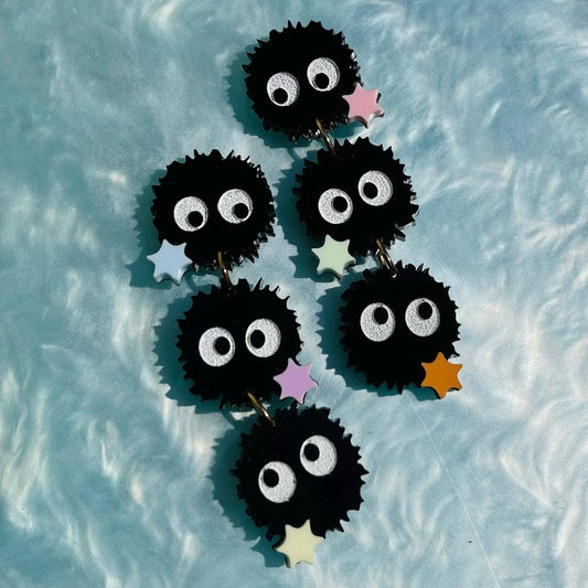 Set of three acrylic soot sprite charms with stars attached together with jump rings to make soot sprite dangling earrings. Inspired by the characters from Studio Ghibli movies